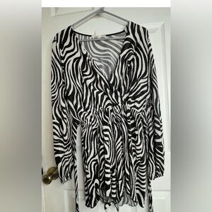 Long sleeve jumpsuit used once.